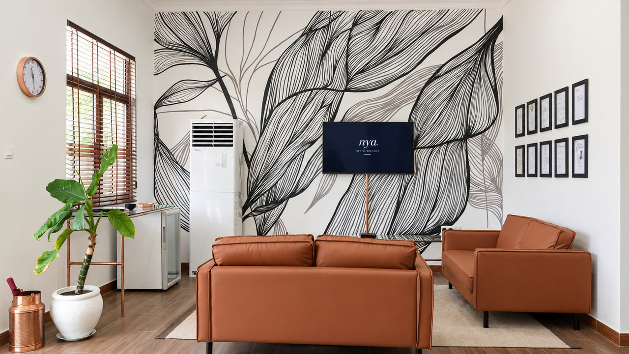 Clinic lounge with a botanical wall mural